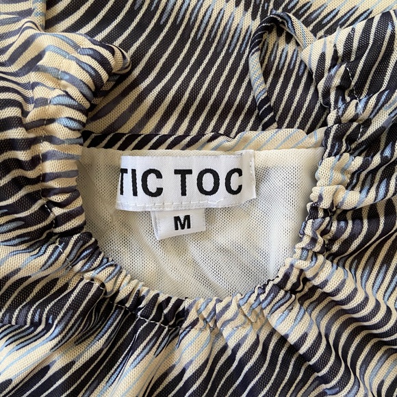 Tic Toc small boutique multicolored (blues and tan) lined pattern mini dress - Picture 3 of 3